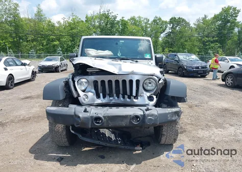 2014 Jeep Wrangler Sport z USA, uszkodzony, nr VIN 1C4GJWAG1EL289034